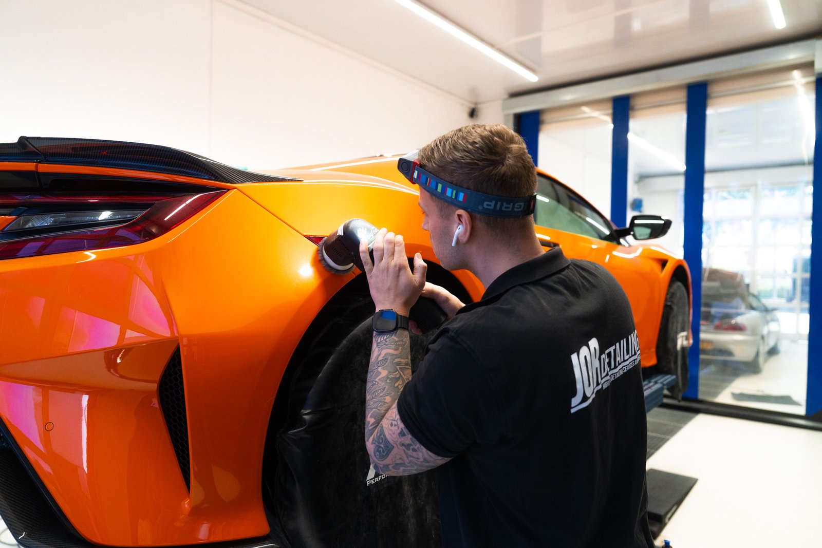 Photo of work on a car at a detailing business
