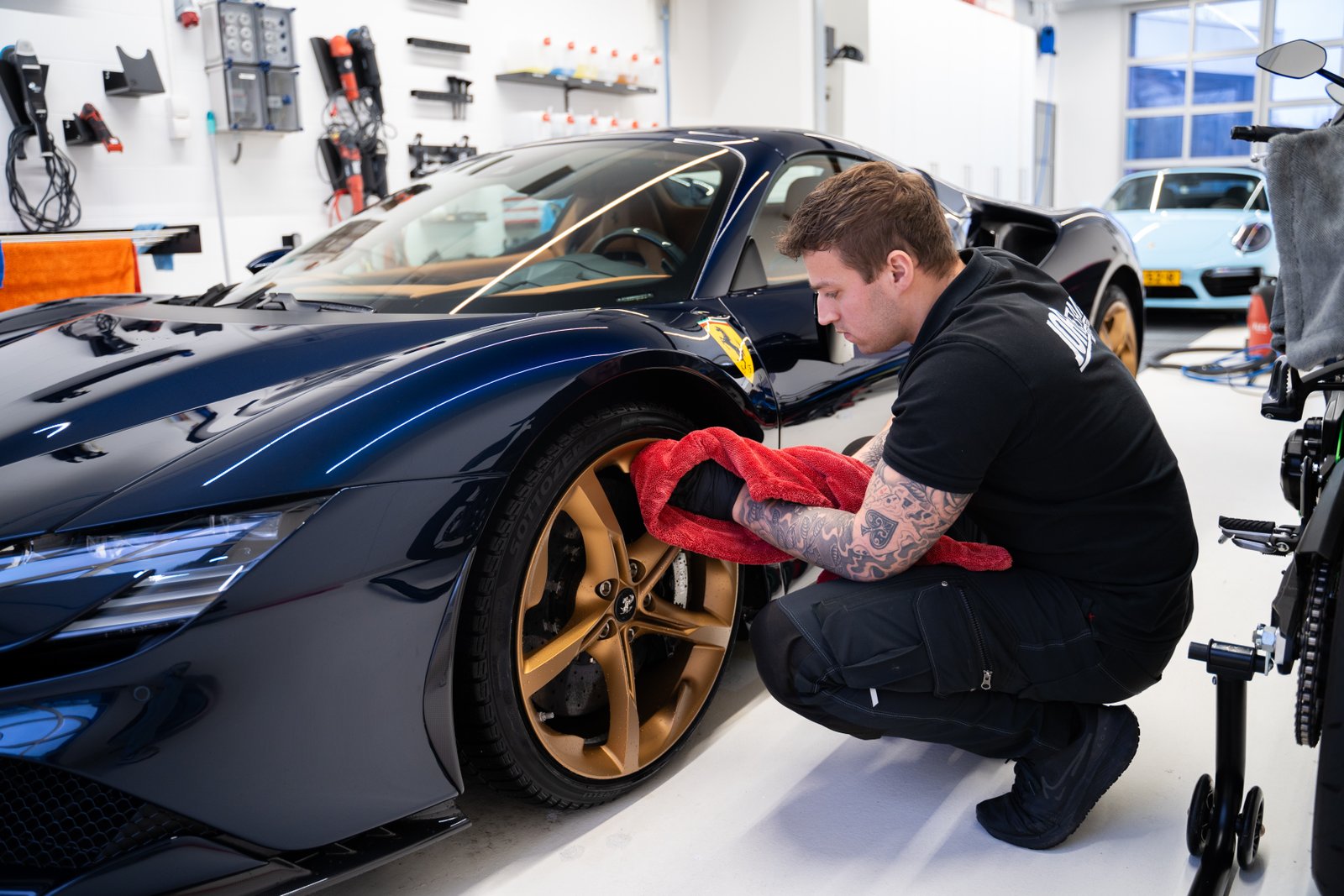 Photo of work on a car at a detailing business