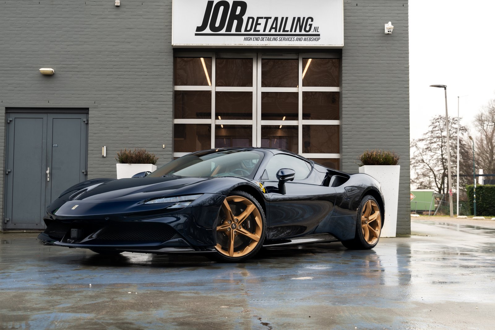 Photo of work on a car at a detailing business