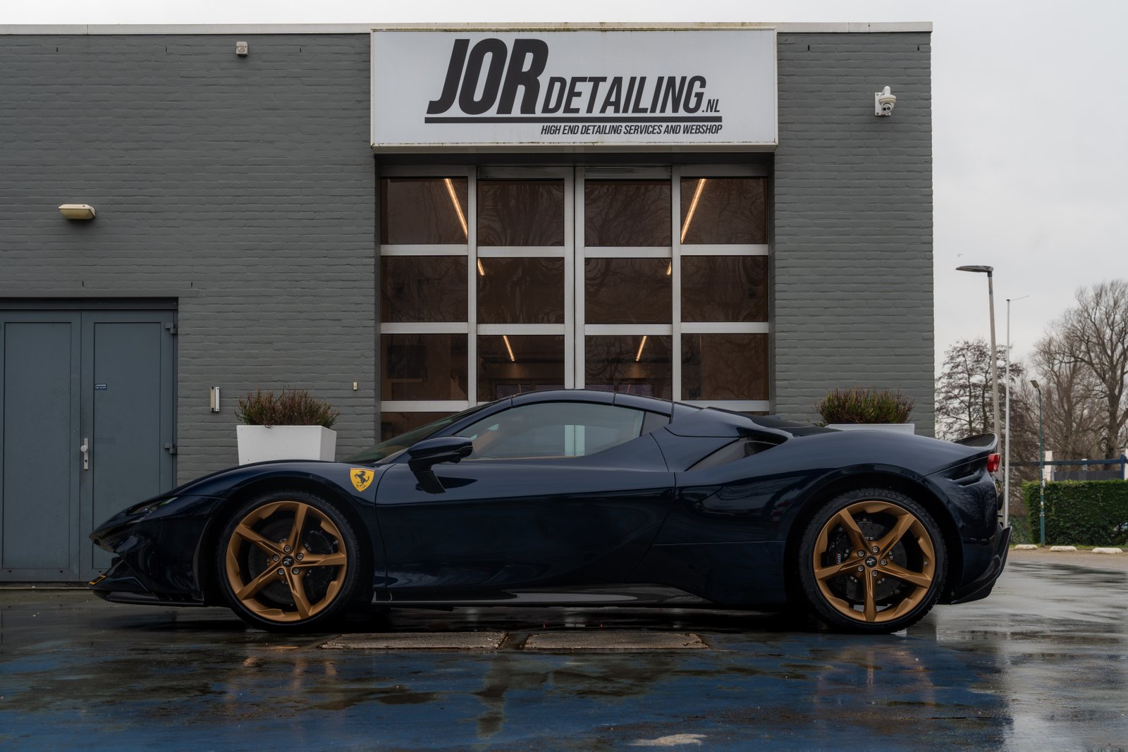 Photo of work on a car at a detailing business