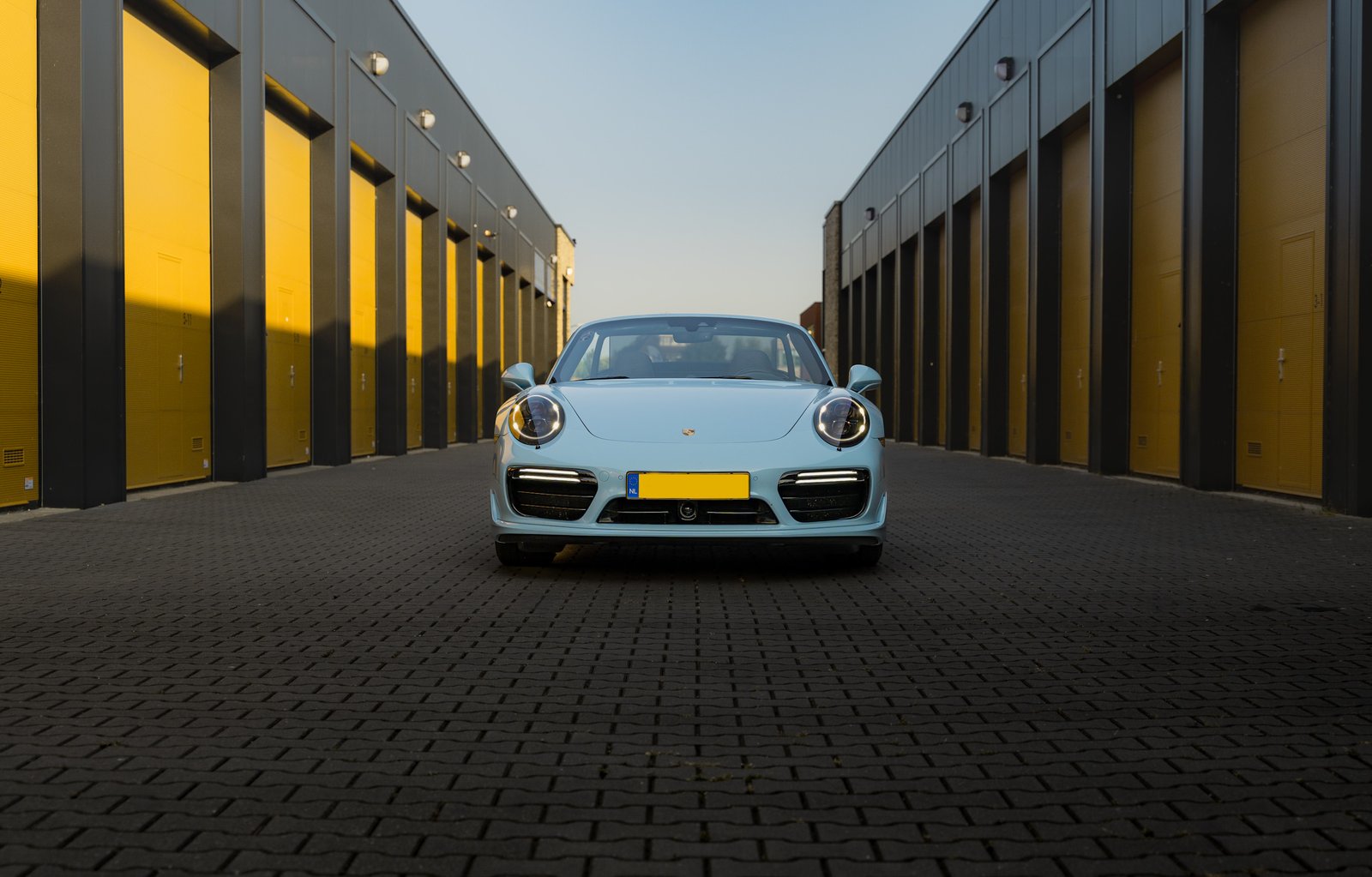Front view of Gulf blue Porsche turbo S