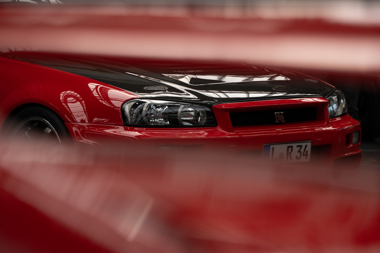 Shoot through to see the front of an R34 Skyline