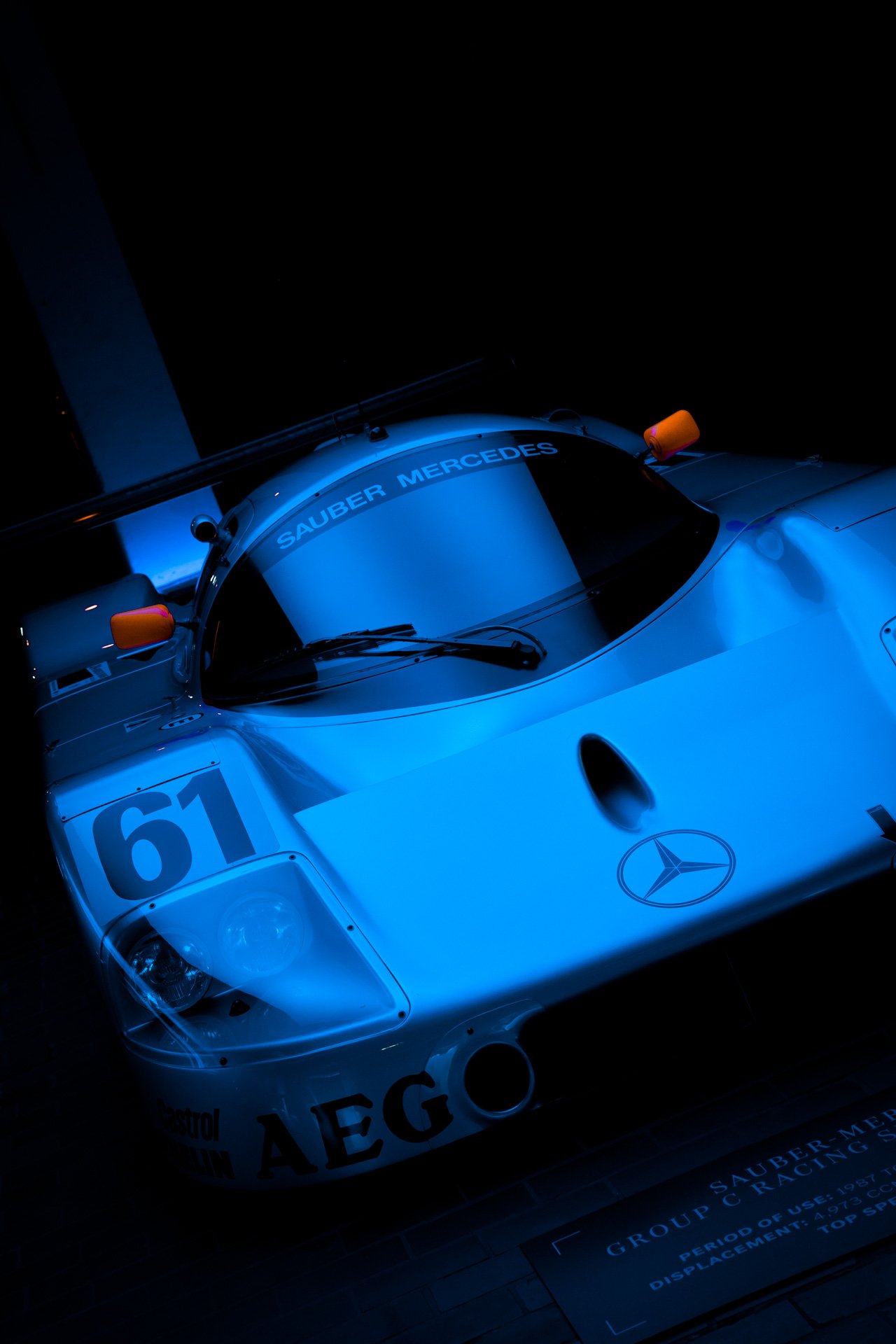 Photo in blue of an old Sauber Mercedes race car
