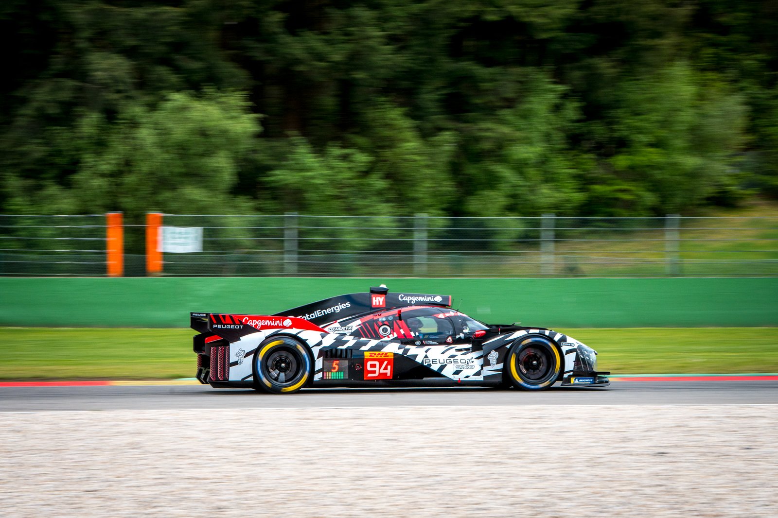 Awesome colours of the Peugeot hypercar on track