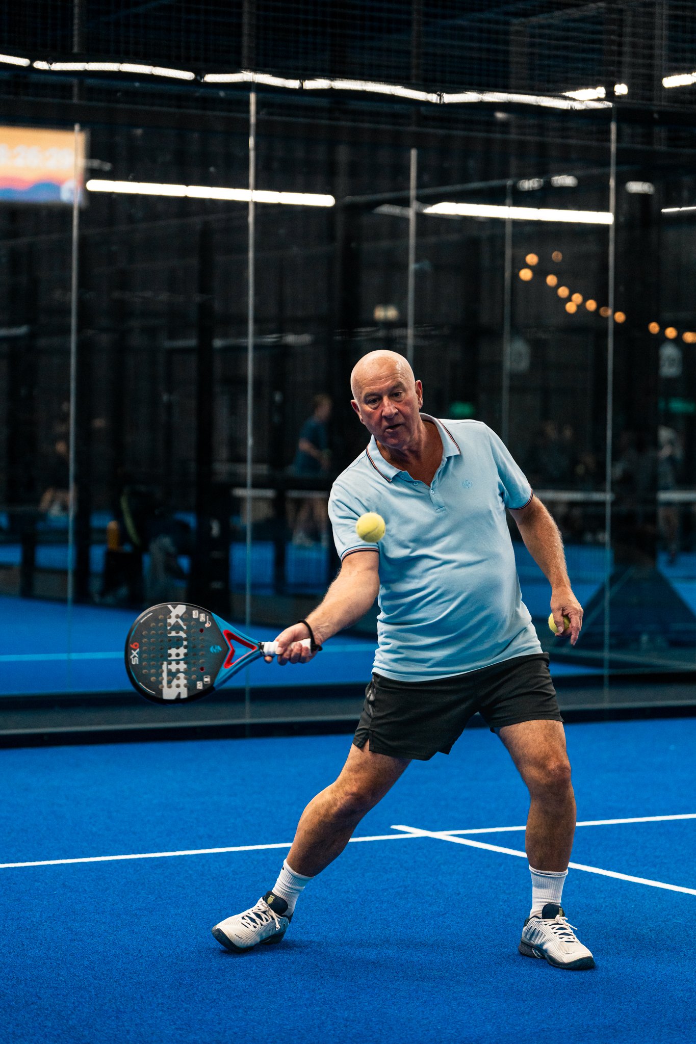 Hitting a return during a padel match
