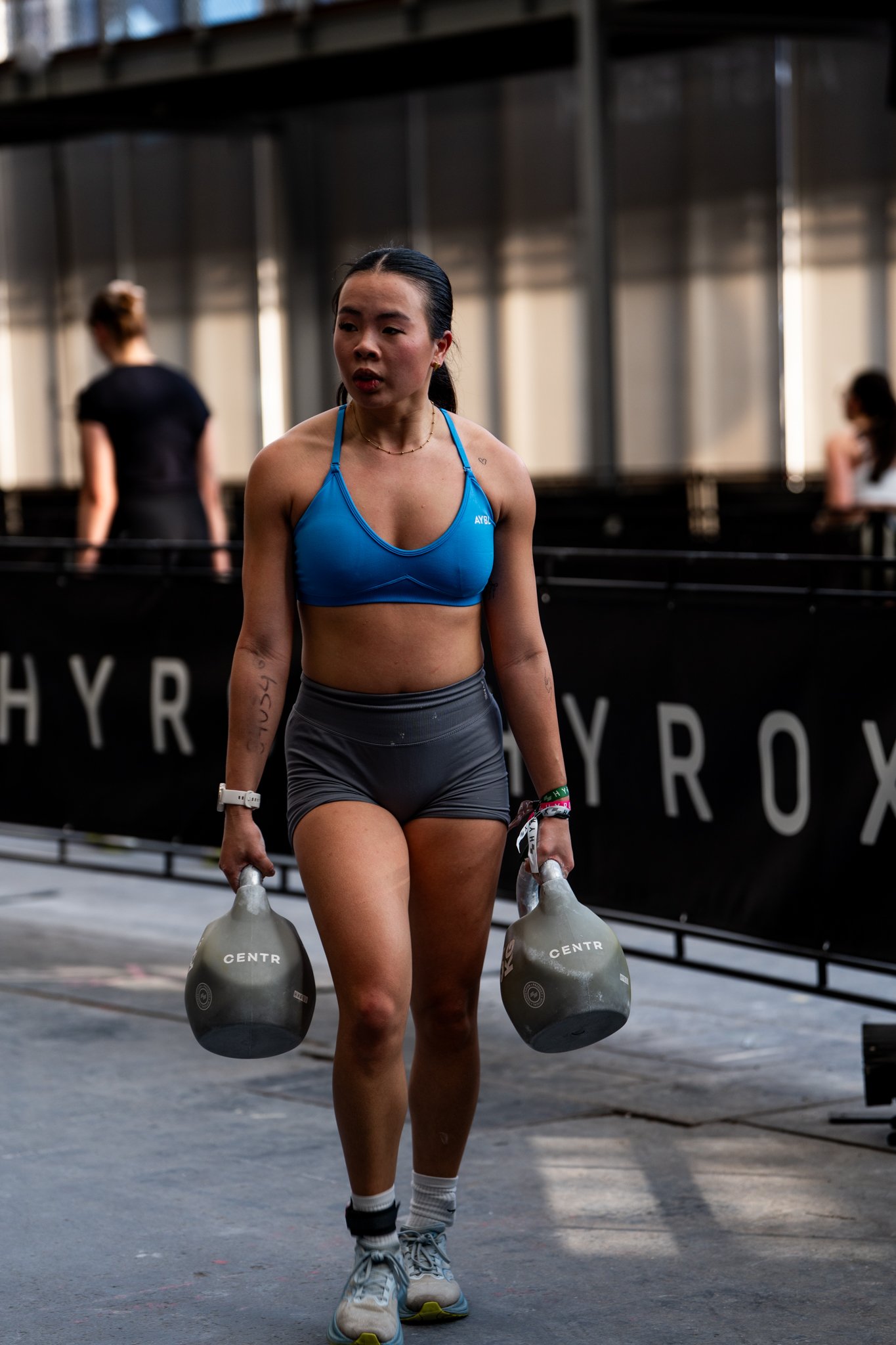 Kettlebell Farmers carry during Hyrox event